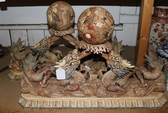 A pair of Chinese bone dragon and flaming jewel figures(-)